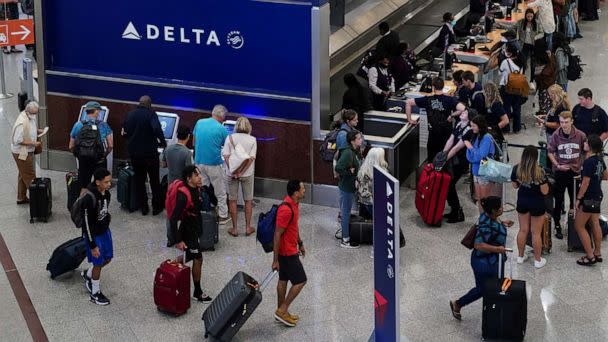 PHOTO: Passengers are seen at the Delta Air Lines check in area before their flights at Hartsfield-Jackson Atlanta International Airport in Atlanta, June 28, 2022.  (Elijah Nouvelage/Reuters)