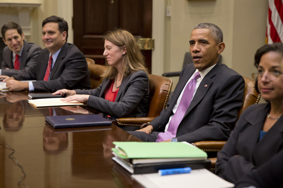 President Barack Obama, second from right, meets with, from left, Centers for Disease Control and Prevention director Dr. Thomas Frieden, Ebola coordinator Ron Klain, Health and Human Services Secretary Sylvia Burwell, National Security Adviser Susan Rice, and members of the president's national security and public health teams to receive an update on the Ebola response, Tuesday, Nov. 4, 2014, at the White House.