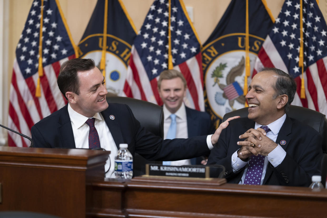 Chairman Mike Gallagher, R-Wis., left, working with Rep. Raja Krishnamoorthi, D-Ill., the ranking member, right, leads the newly-formed House Select Committee on the Strategic Competition Between the United States and the Chinese Communist Party, as the panel adopts its rules ahead of a primetime hearing later tonight, at the Capitol in Washington, Tuesday, Feb. 28, 2023. Gallagher says he wants to overcome partisan divisions and inform Americans about the threat posed by the Chinese Communist Party. (AP Photo/J. Scott Applewhite)