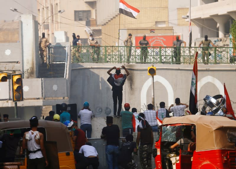 Demonstrators take part during the ongoing anti-government protests in Baghdad