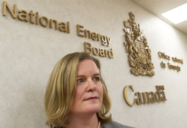 National Energy Boards' Sarah Kiley after answering questions about the Joint Review Panel report regarding the proposed Enbridge Northern Gateway pipeline project during a press conference in Calgary on Thursday, December 19, 2013. THE CANADIAN PRESS/Larry MacDougal