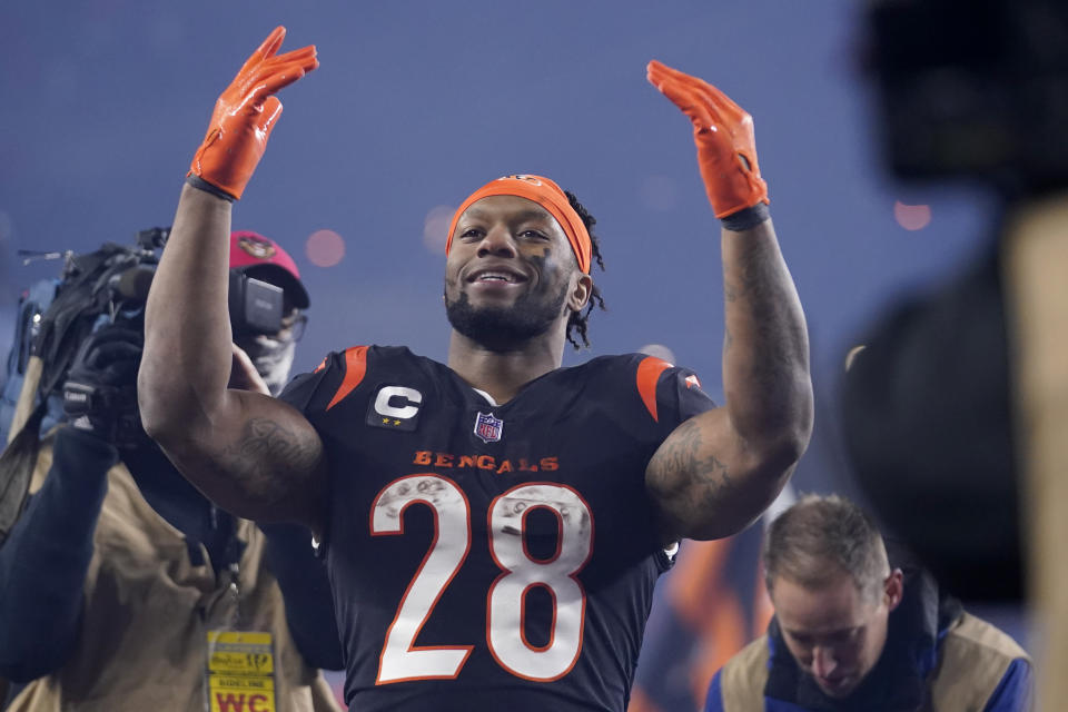 Cincinnati Bengals running back Joe Mixon celebrates following an NFL wild-card playoff football game against the Baltimore Ravens in Cincinnati, Sunday, Jan. 15, 2023. The Bengals won 24-17. (AP Photo/Jeff Dean)