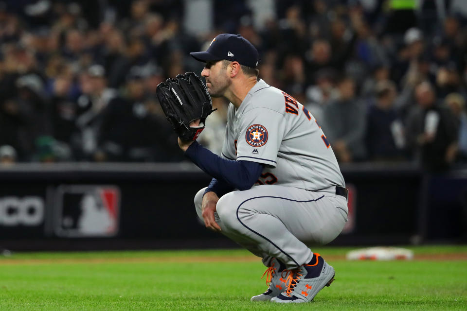 BRONX, NY - OCTOBER 18:  Justin Verlander #35 of the Houston Astros reacts after giving up a three-run home run to Aaron Hicks #31 of the New York Yankees during the first inning of Game 5 of the ALCS between the Houston Astros and the New York Yankees at Yankee Stadium on Friday, October 18, 2019 in the Bronx borough of New York City. (Photo by Alex Trautwig/MLB Photos via Getty Images)