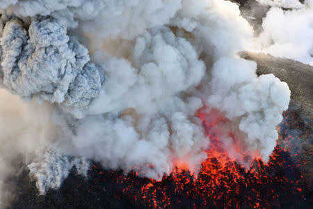 An aerial view shows Shinmoedake peak erupting between Miyazaki and Kagoshima prefectures, southwestern Japan, in this photo taken by Kyodo March 6, 2018. Mandatory credit Kyodo/via REUTERS