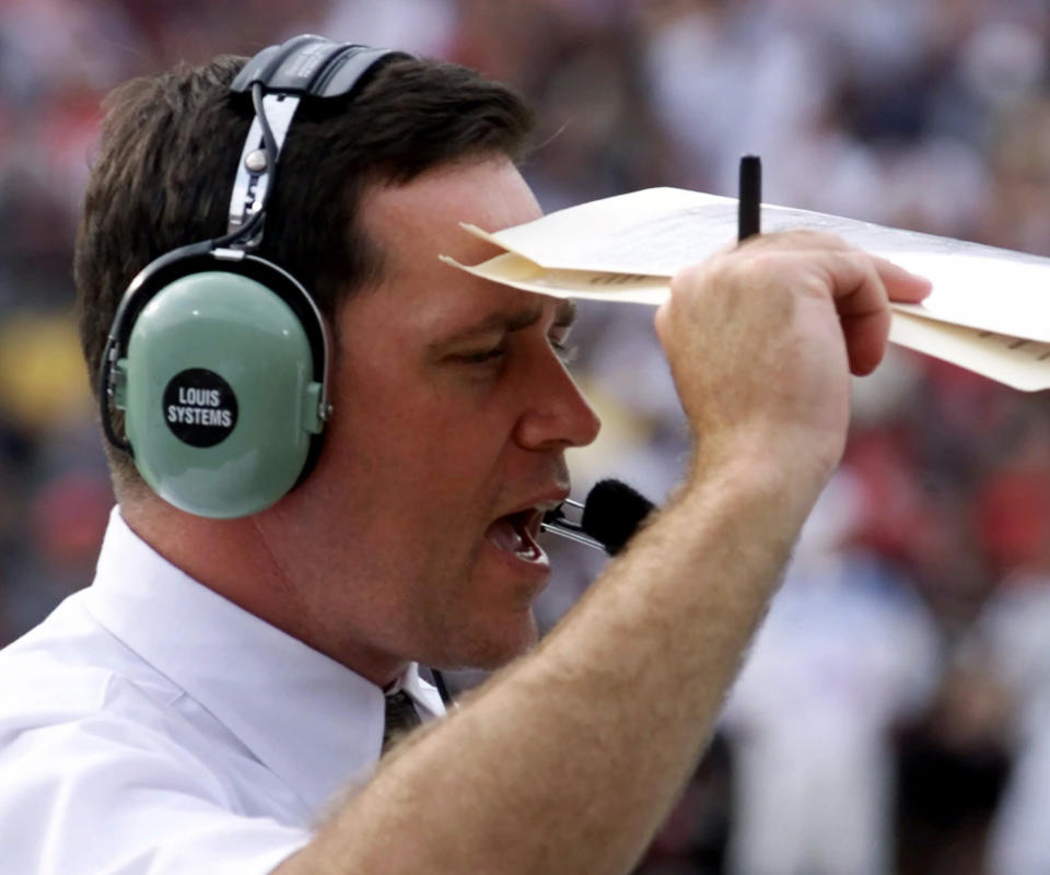 FILE - In this Sept. 4, 2000, file photo, Army head coach Todd Berry works on the sidelines during the first half of an NCAA college football game against Cincinnati in Cincinnati. Twenty years later, former Army football coach Todd Berry still gets choked up thinking about that Sept. 11, 2001, day and the terrorist attacks carried out not only on the twin towers at the World Trade Center but at the Pentagon, and in a field in rural Pennsylvania. (AP Photo/Al Behrman, File)