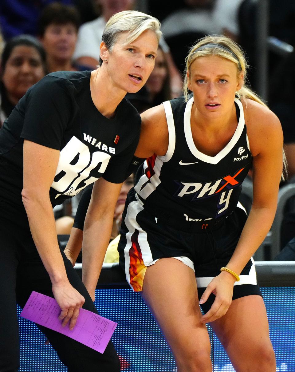May 6, 2022; Phoenix, Arizona; USA; Mercury's head coach Vanessa Nygaard talks with Sophie Cunningham (9) before she comes to the court during the home opener against the Aces.