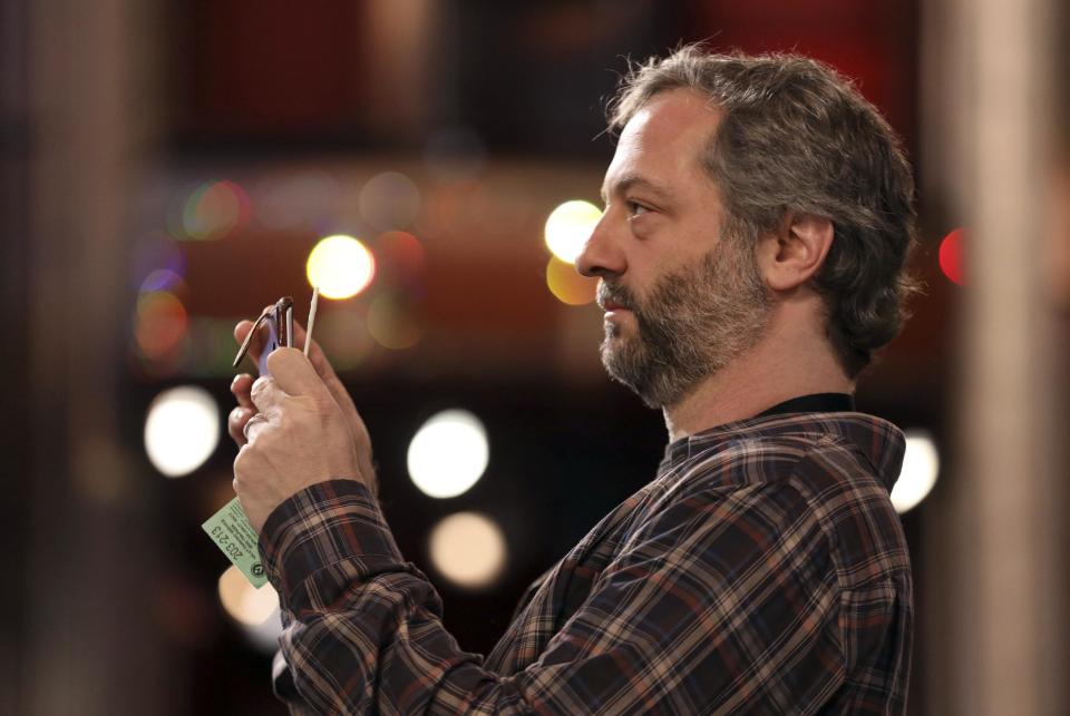 Judd Apatow, watches wife Leslie Mann, not pictured, during rehearsals for the 89th Academy Awards on Saturday, Feb. 25, 2017. The Academy Awards will be held at the Dolby Theatre on Sunday, Feb. 26. (Photo by Matt Sayles/Invision/AP)