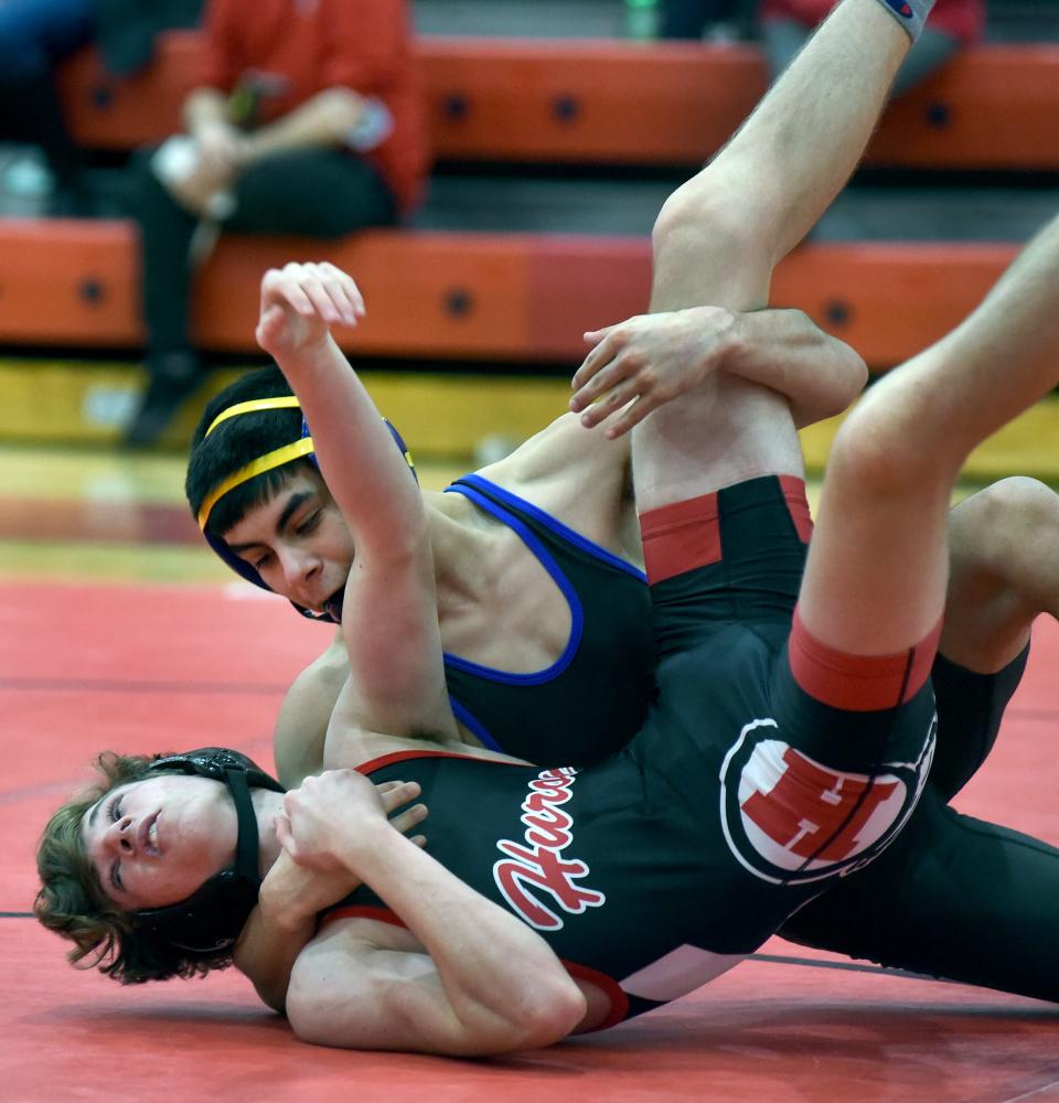 Cody Richards of Jefferson beat Carson Gemmel of Huron 18-7 in the 112 pound match for the Huron League Championship at Milan Saturday, February 5, 2022.