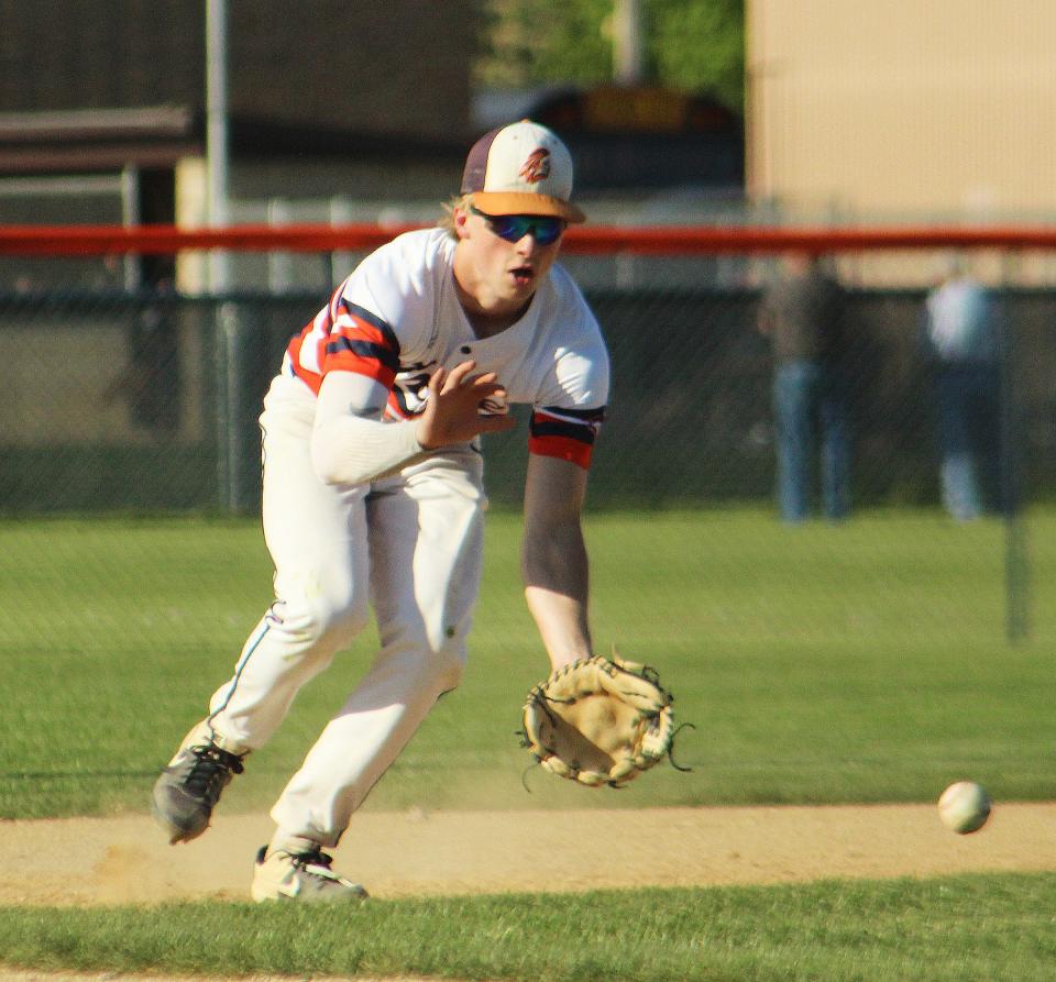 Pontiac third baseman Drew Wayman charges in to field a grounder during Thursday's 4-3 win over Paxton-Buckley-Loda.