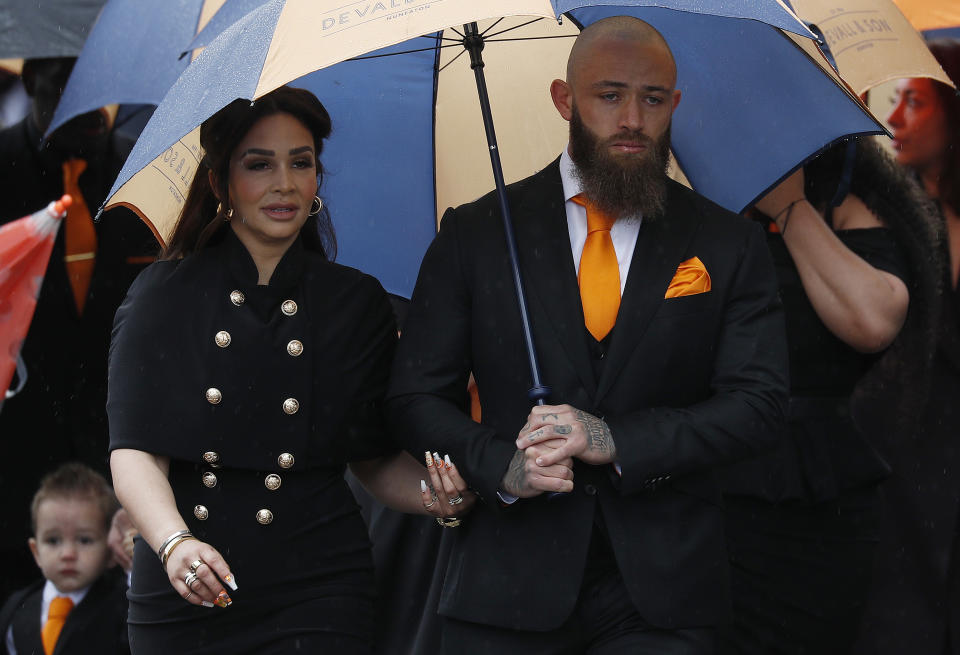 NUNEATON, ENGLAND - MAY 21: Ashley Cain and Safiyya Vorajee follow the funeral cortege of their daughter Azaylia on May 21, 2021 in Nuneaton, England.  Azaylia Cain - the daughter of former Coventry City footballer and Ex on the Beach reality TV star, Ashley Cain - lost her life to a rare form of leukaemia on Sunday, April 25. The eight-month-old's battle against the illness inspired messages of support from people across the globe, including from Hollywood actor Dwayne 'The Rock' Johnson. (Photo by Darren Staples/Getty Images)
