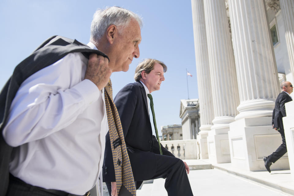 Former Sen. Jon Kyl (R-Ariz.), left, seen on July 10 as he escorts Supreme Court nominee Brett Kavanaugh and Vice President Mike Pence to meetings with senators. (Photo: Tom Williams via Getty Images)