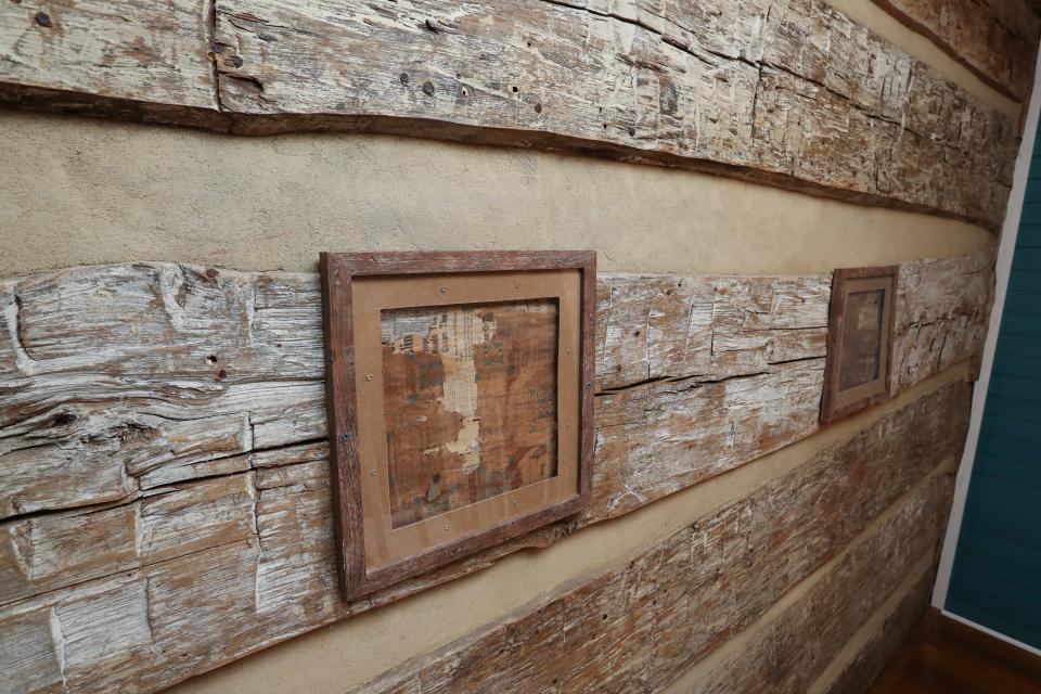 Layers of original wallpaper (newspaper clippings in some instances) were framed and displayed inside the Hutchins home built in 1780 in Bardstown, Ky. on Oct. 24, 2023.