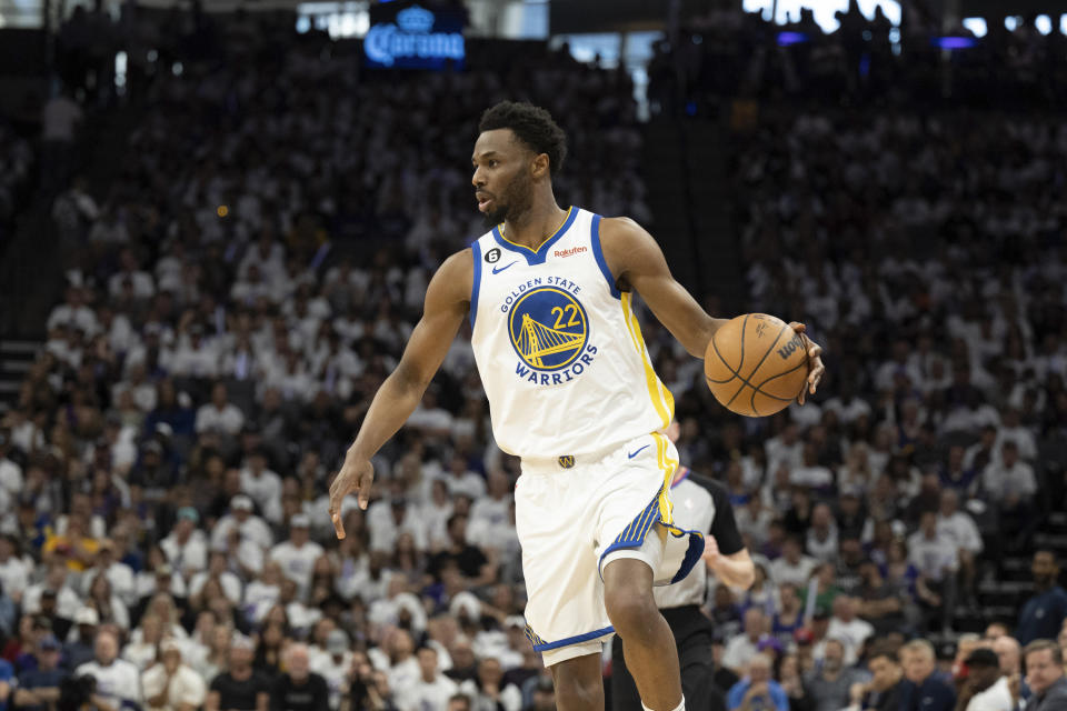 Golden State Warriors forward Andrew Wiggins (22) scans the floor on the offensive end in the second quarter during Game 1 against the Sacramento Kings in the first round of the NBA basketball playoffs in Sacramento, Calif., Saturday, April 15, 2023. (AP Photo/José Luis Villegas)