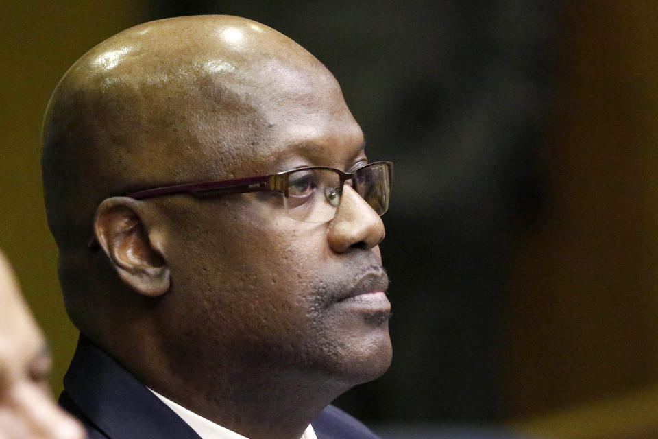 Defendant Curtis Flowers, stands at a bail hearing in Winona, Miss., Monday, Dec. 16, 2019. Flowers has been tried six times for murder in the 1996 shooting deaths of four people in a furniture store. Although sentenced to death during the sixth trial, the U.S. Supreme Court overturned that conviction in June, finding that prosecutors had shown a pattern of improperly excluding African American jurors in the trials of Flowers, who is black. Flowers was granted bail. (AP Photo/Rogelio V. Solis)