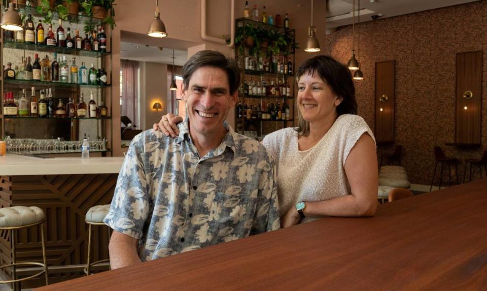 David and Kelly English sit inside their new establishment, Juju Kitchen & Cocktails, at 15th and L streets in downtown Sacramento on Thursday. David is the former owner and chef at The Press Bistro which closed in 2019.