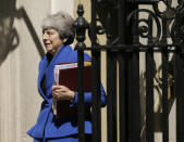 Britain's Prime Minister Theresa May leaves 10 Downing Street, for the House of Commons to attend Prime Minister's Questions in London, Wednesday, July 24, 2019. Boris Johnson will replace May as Prime Minister later Wednesday, following her resignation last month after Parliament repeatedly rejected the Brexit withdrawal agreement she struck with the European Union. (AP Photo/Tim Ireland)