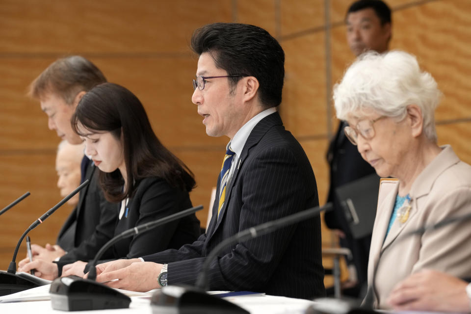 Takuya Yokota, Secretary-General of the Association of Families of Victims Kidnapped by North Korea, center, speaks to U.S. Ambassador to United Nations Linda Thomas-Greenfield, not in picture on Thursday, April 18, 2024, at prime minister's office in Tokyo. (AP Photo/Eugene Hoshiko, Pool)