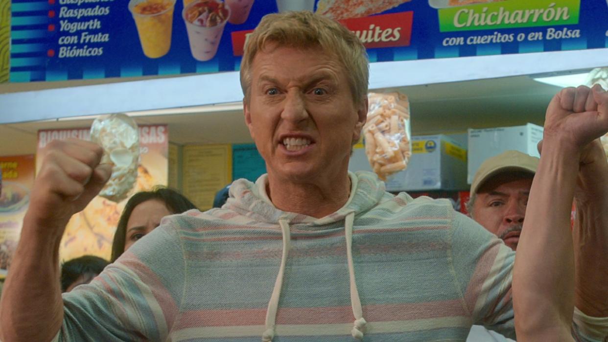  William Zabka in Netflix's Cobra Kai pumping his fists. 