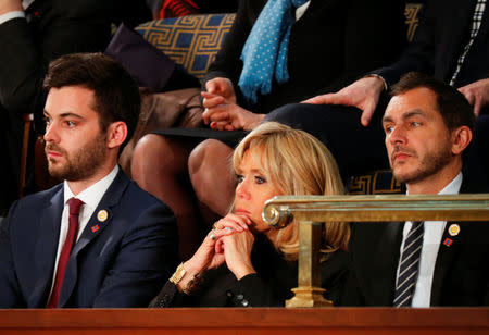 Brigitte Macron wife of French President Emmanuel Macron listens during a joint meeting of Congress in the House chamber of the U.S. Capitol in Washington, U.S., April 25, 2018. REUTERS/Brian Snyder