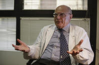 Virologist Massimo Galli, director of the Sacco hospital in Milan, answers questions during an interview with the Associated Press, at the Sacco hospital, in Milan, Italy, Thursday, Oct. 15, 2020. (AP Photo/Luca Bruno)