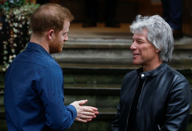 Britain's Prince Harry meets Jon Bon Jovi and members of the Invictus Games Choir in London