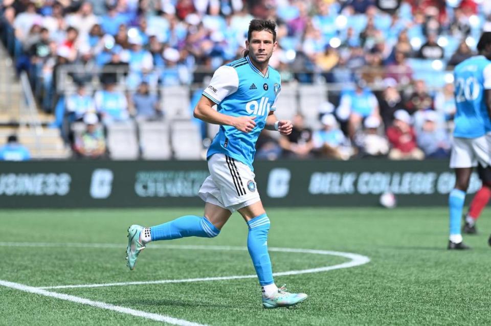 Mar 11, 2023; Charlotte, North Carolina, USA; Charlotte FC midfielder Brandt Bronico (13) runs on against Atlanta United in the second half at Bank of America Stadium. Mandatory Credit: Griffin Zetterberg-USA TODAY Sports