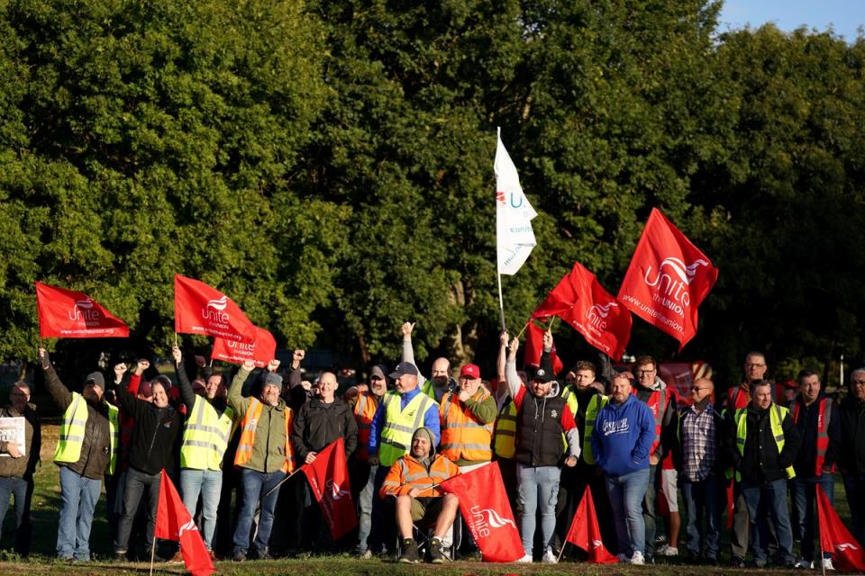 Members of the Unite union man a picket line at one of the entrances to the Port of Felixstowe in Suffolk in a long-running dispute over pay. (Joe Giddens/PA) (PA Wire)