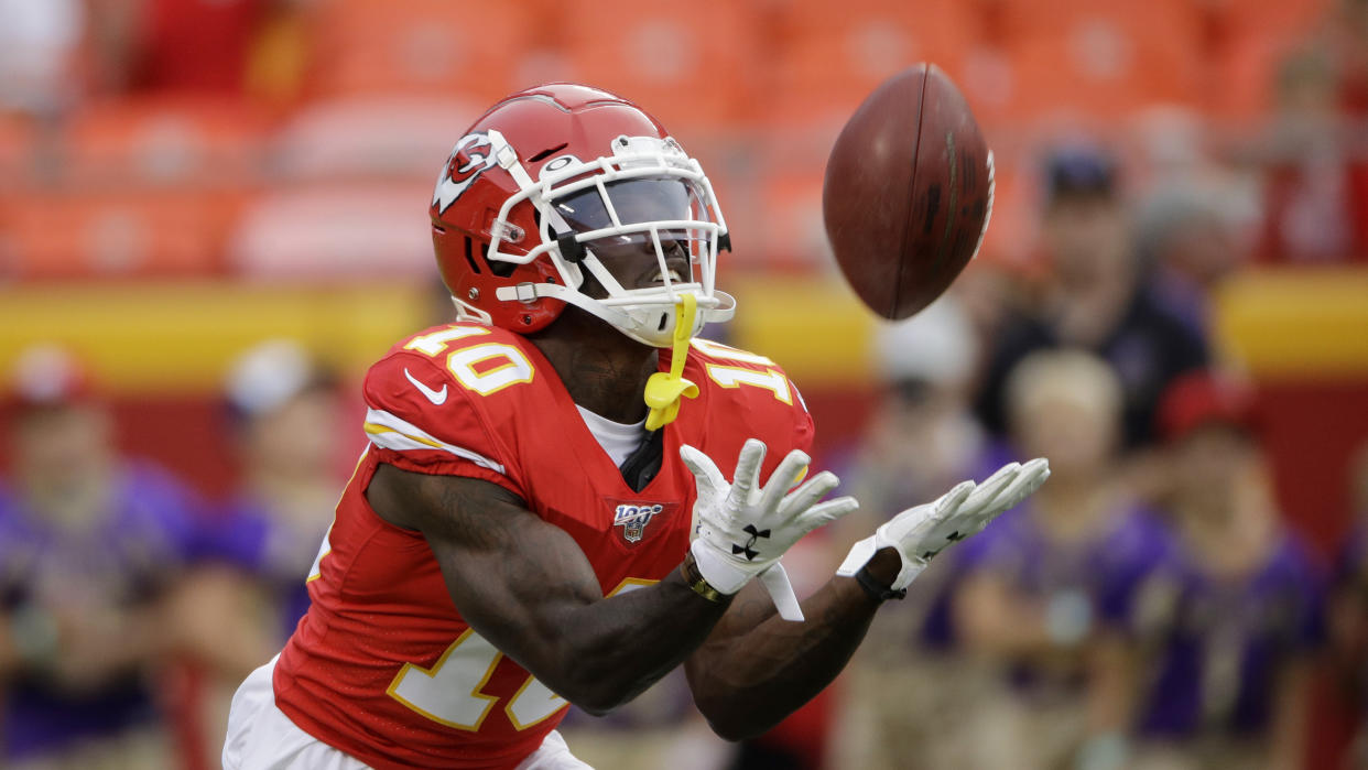 Kansas City Chiefs wide receiver Tyreek Hill (10) makes a catch before an NFL preseason football game against the San Francisco 49ers in Kansas City, Mo., Saturday, Aug. 24, 2019. (AP Photo/Charlie Riedel)