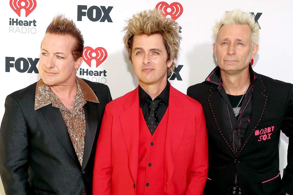 <p>Jesse Grant/Getty</p> Tré Cool, Billie Joe Armstrong and Mike Dirnt of Greenday in April 2024