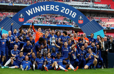 Soccer Football - FA Cup Final - Chelsea vs Manchester United - Wembley Stadium, London, Britain - May 19, 2018 Chelsea celebrate winning the final with the trophy REUTERS/David Klein