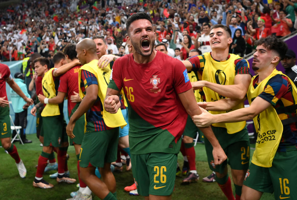 LUSAIL CITY, QATAR - DECEMBER 06: Goncalo Ramos of Portugal celebrates after scoring the team's first goal during the FIFA World Cup Qatar 2022 Round of 16 match between Portugal and Switzerland at Lusail Stadium on December 06, 2022 in Lusail City, Qatar. (Photo by Justin Setterfield/Getty Images)