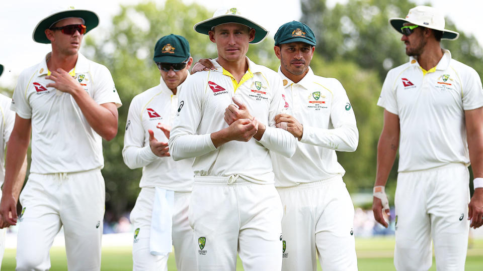 Josh Hazlewood (L) and Mitchell Starc (R) were unable to bowl out the tail. (Photo by Matthew Lewis/Getty Images)