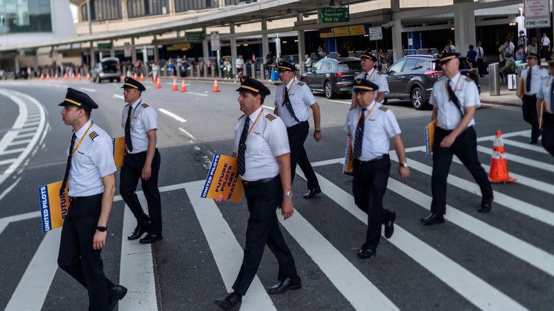 FILE PHOTO: Pilots from United Airlines take part in an informational picket at Newark Liberty International Airport in Newark