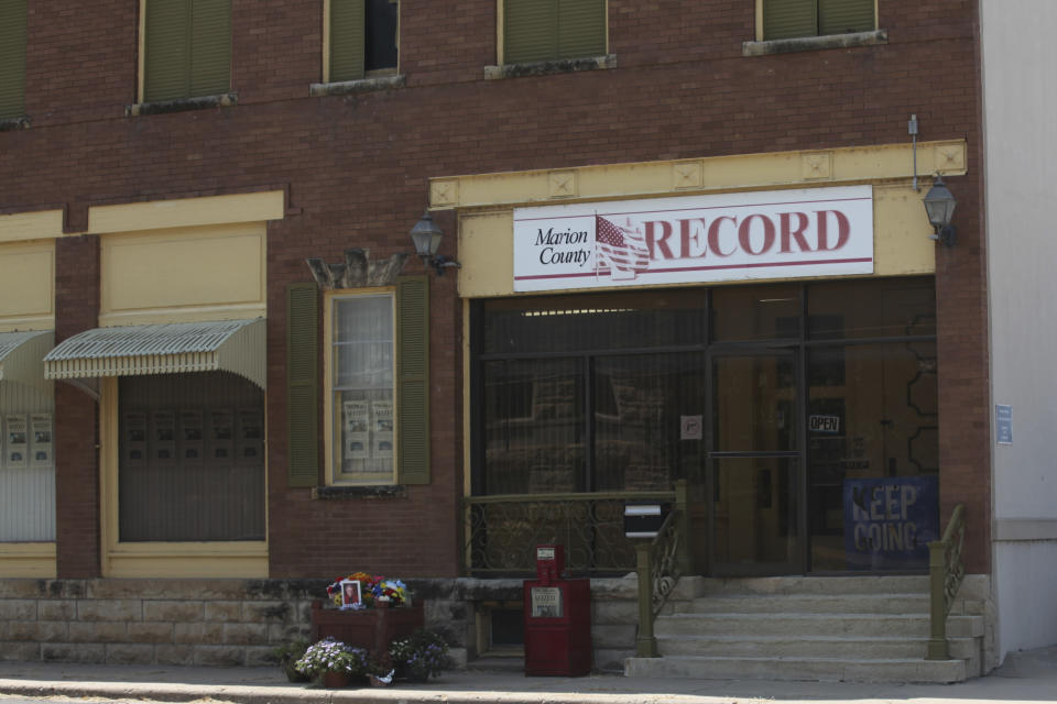 FILE - The offices of the Marion County Record weekly newspaper sit across the street from the Marion County, Kan., Courthouse, Aug. 21, 2023, in Marion. The lawyer for the small Kansas newspaper raided by police in August 2023 said on Tuesday, Sept. 5, that he believes officers didn't follow the search warrant's requirements to only seize computers believed directly involved in suspected identity theft. (AP Photo/John Hanna, File)