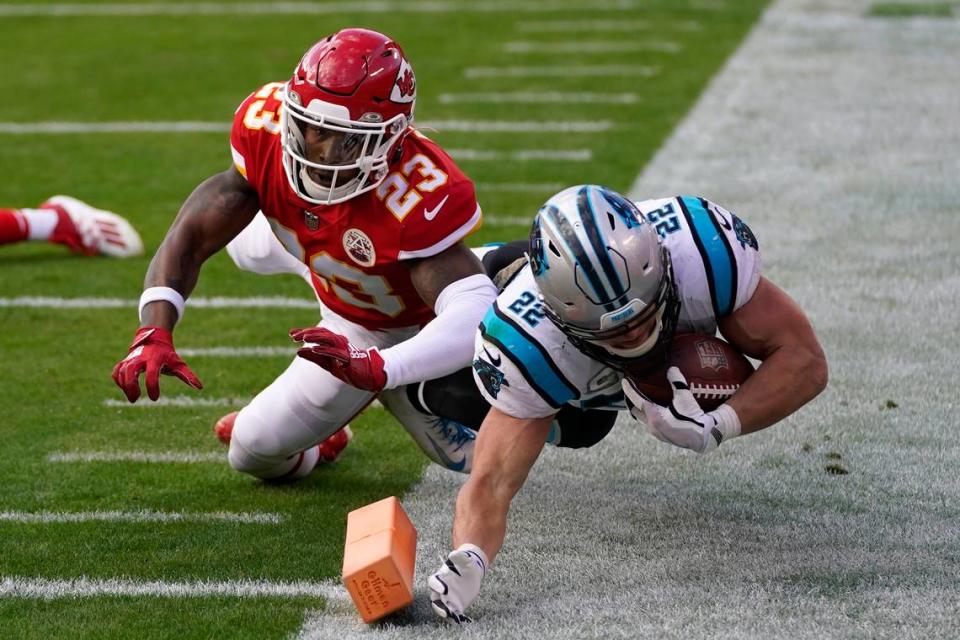 Carolina Panthers running back Christian McCaffrey (22) is knocked out of bounds by Kansas City Chiefs safety Armani Watts (23) during the second half of an NFL football game in Kansas City, Mo., Sunday, Nov. 8, 2020. (AP Photo/Jeff Roberson)
