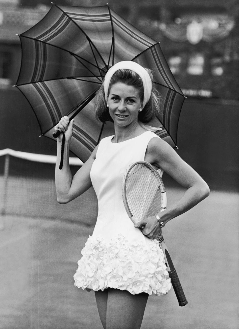 23rd June 1965: Italian tennis star Lea Pericoli wearing a rose-trimmed tennis dress designed by British sportwear designer Teddy Tinling at Wimbledon. (Photo by Keystone/Getty Images)