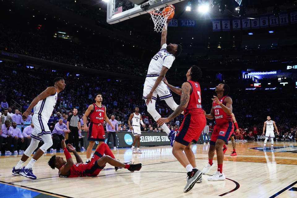 Kansas State's Nae'Qwan Tomlin (35) goes up for a basket in the second half of an Elite 8 college basketball game against Florida Atlantic in the NCAA Tournament's East Region final, Saturday, March 25, 2023, in New York. Florida Atlantic won 79-76. (AP Photo/Frank Franklin II)