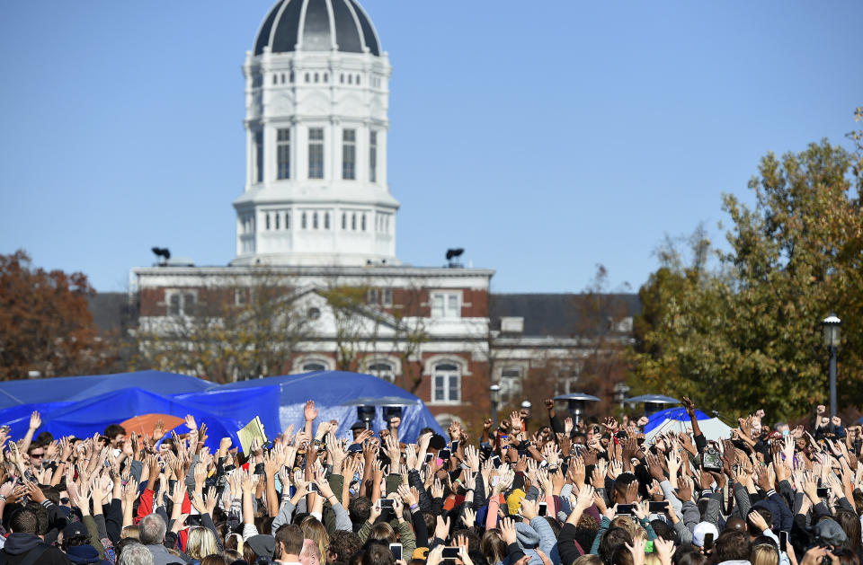 Student protesters on the campus of the University of Missouri in Columbia react to news of the resignation of University of Missouri system President Tim Wolfe on Monday, Nov. 9, 2015. Wolfe resigned under pressure from student protesters who claimed the president had not done enough to address recent racially-motivated incidents on the campus. (David Eulitt/Kansas City Star/TNS via Getty Images)