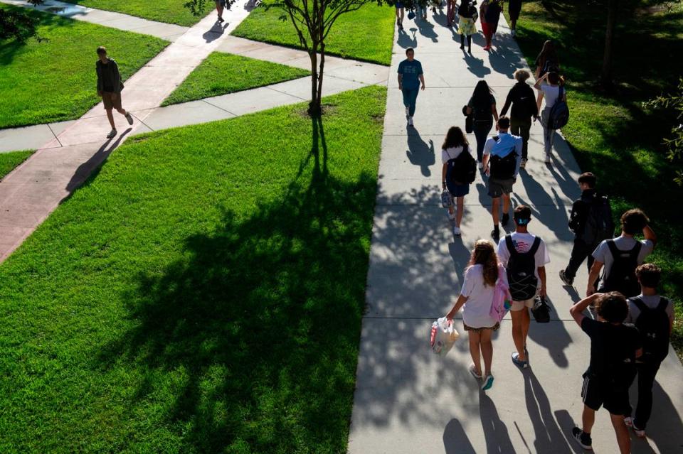 High school students walk between classes on the first day of school at Ocean Springs High School in Ocean Springs on Friday, Aug. 5, 2022. Ocean Springs ranked number two in the state.