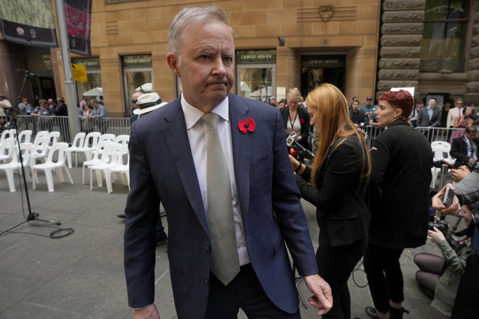 Australian Prime Minister Anthony Albanese leaves Remembrance Day ceremonies in Sydney, Friday, Nov. 11, 2022. Albanese has said he'd ask Chinese President Xi Jinping to lift billions of dollars in trade barriers if the two leaders hold their first bilateral meeting this month.(AP Photo/Rick Rycroft)