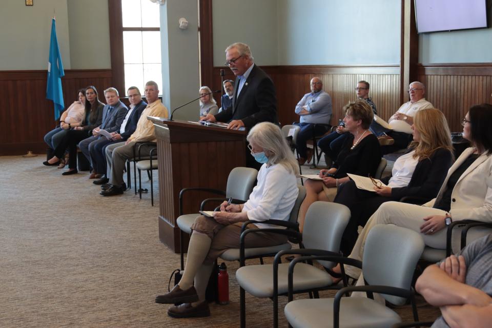 Tecumseh Mayor Jack Baker addresses the Adrian City Commission during its special meeting Monday about Lenawee County's proposed Project Phoenix recreation and events center in Tecumseh.