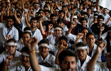 Medical students participate in a protest called by Indian Medical Association (IMA), during a nationwide doctors strike in Ahmedabad