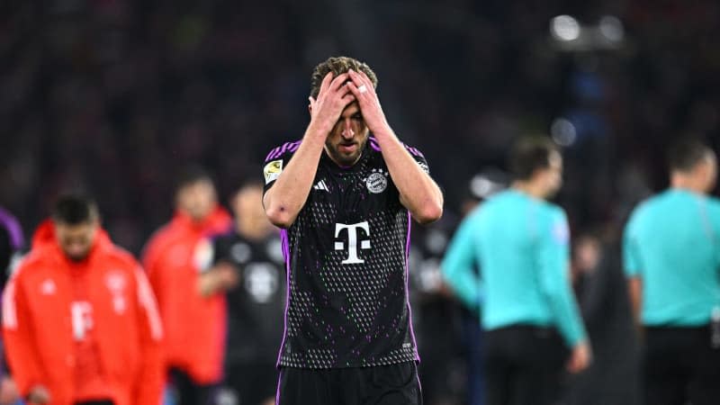 Munich's Harry Kane looks dejected after the German Bundesliga soccer match between SC Freiburg and Bayern Munich at Europa-Park Stadium. Tom Weller/dpa