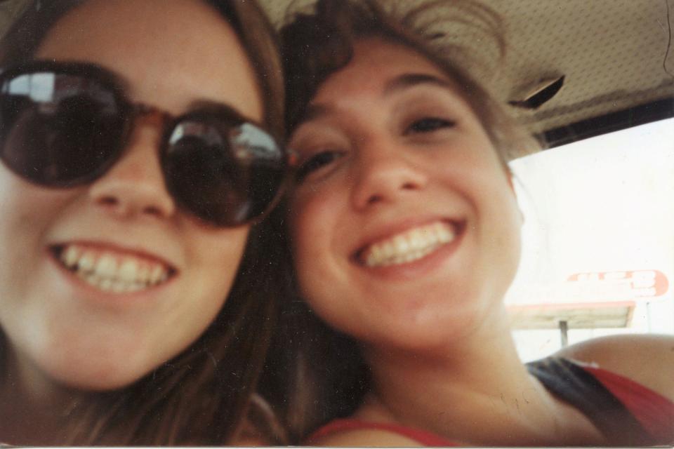Eliza Thomas, right, was 17 when she was murdered inside the yogurt shop. In this photo taken a few months before her death, Eliza is seen with her younger sister Sonora who was 13 when her sister died. In 2021, Sonora told 