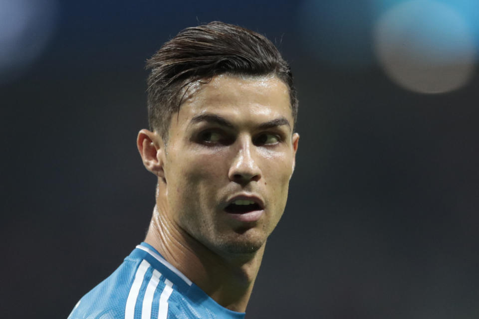 Juventus' Cristiano Ronaldo looks back during the Champions League Group D soccer match between Atletico Madrid and Juventus at the Wanda Metropolitano stadium in Madrid, Spain, Wednesday, Sept. 18, 2019. (AP Photo/Bernat Armangue)