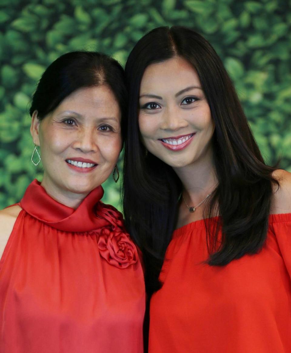 Lily Wu, right, poses with her mother, Anna Wu.