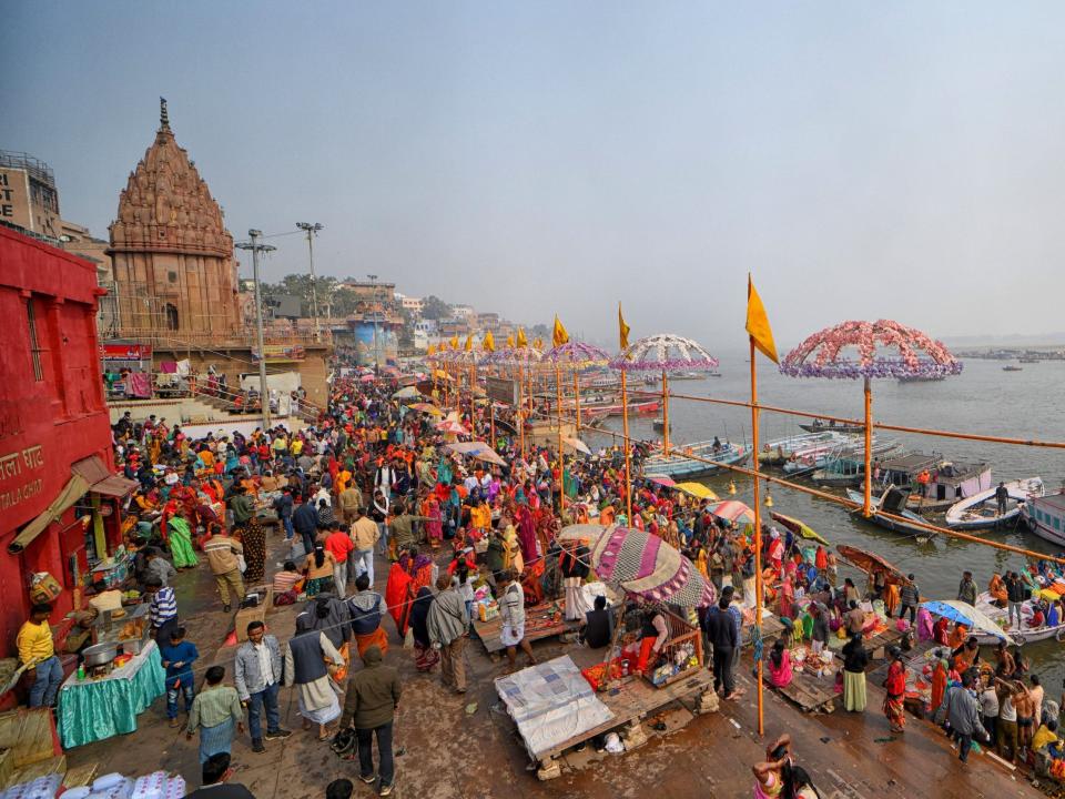 Hindu devotees gather to take a holy dip at the Ganges River, on the auspicious bathing day of "Mauni Amavasya" during the annual religious "Magh Mela" festival.