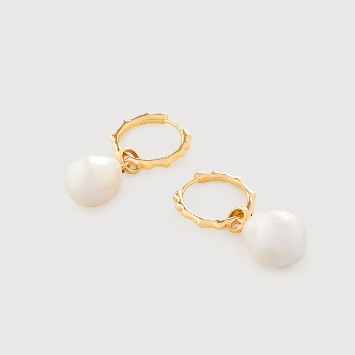 <p><a href="https://go.redirectingat.com?id=74968X1596630&url=https%3A%2F%2Fwww.monicavinader.com%2Fus%2Fgift-sets%2Fsiren-muse-pearl-ripple-small-hoop-earrings&sref=https%3A%2F%2Fwww.townandcountrymag.com%2Fstyle%2Fjewelry-and-watches%2Fg34464609%2Fkate-middleton-meghan-markle-wear-monica-vinader-jewelry%2F" rel="nofollow noopener" target="_blank" data-ylk="slk:Shop Now;elm:context_link;itc:0;sec:content-canvas" class="link rapid-noclick-resp">Shop Now</a></p><p>Siren Muse Pearl Ripple Small Hoop Earrings</p><p>monicavinader.com</p><p>$291.25</p>