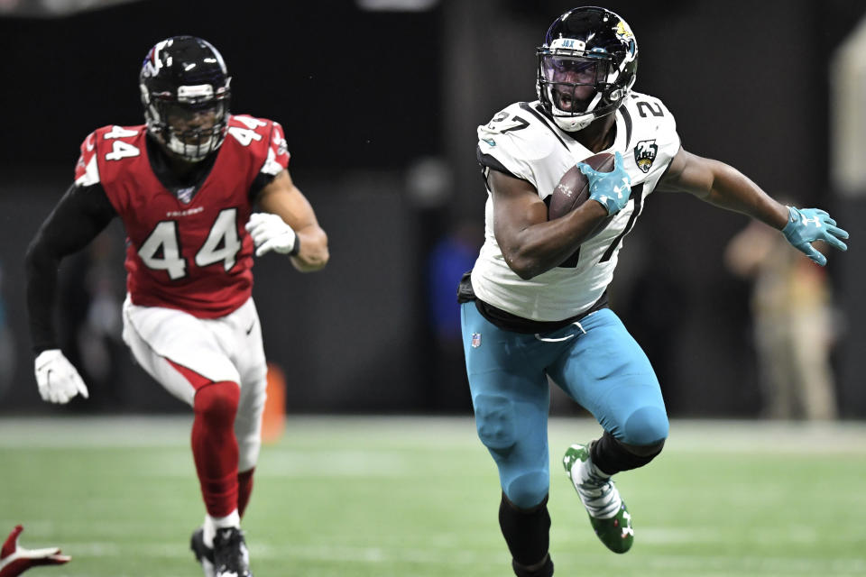 Jacksonville Jaguars running back Leonard Fournette (27) runs against the Atlanta Falcons during the first half of an NFL football game, Sunday, Dec. 22, 2019, in Atlanta. (AP Photo/Danny Karnik)