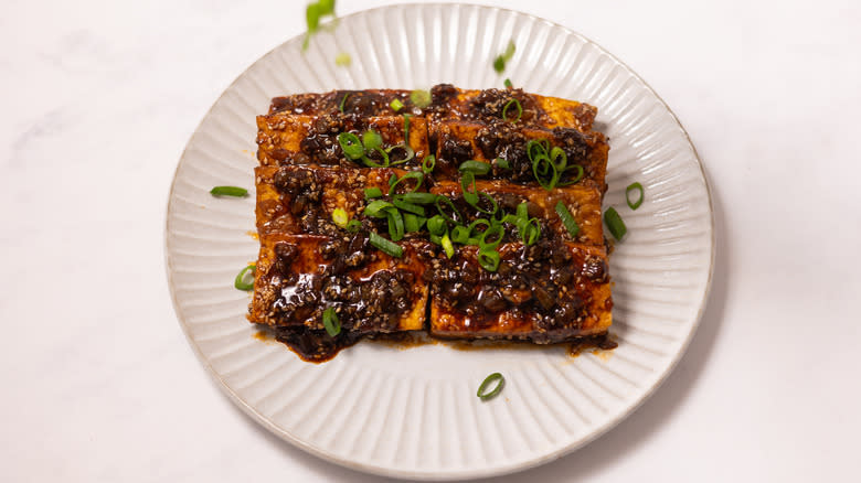 braised tofu with sauce and scallions